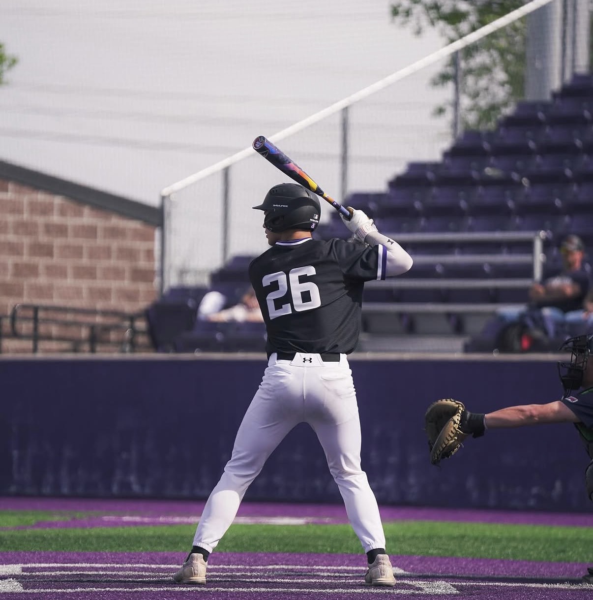 Jax Copeland at the plate wearing number 26