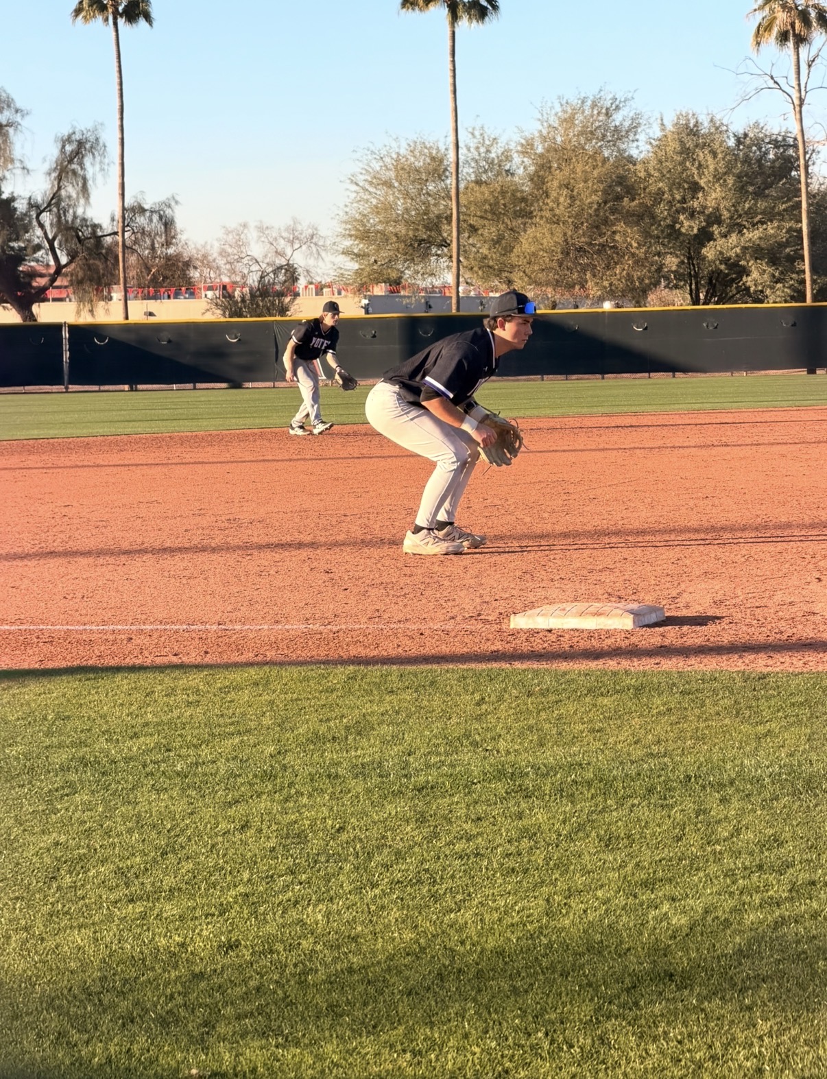 Jax Copeland in a ready stance on the infield during a game